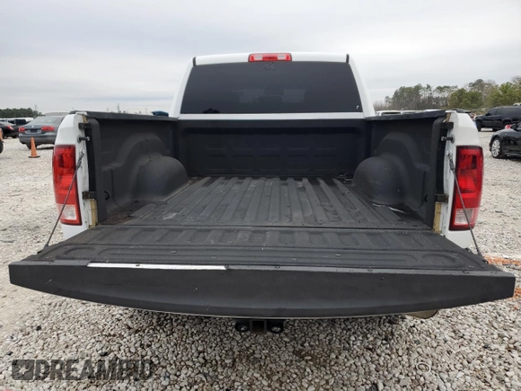 2018 Ram 1500 Tradesman with VIN 1C6RR6KG0JS275343, listed as a Copart auction lot 46490895 with 103,539 mi miles and Salvage title. Bid and sale history available at DreamBid. Image 6.