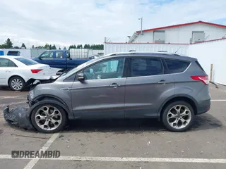 2013 Ford Escape Titanium with VIN 1FMCU9J95DUC95061, listed as a IAAI auction lot 42293047 with 124,641 mi miles and . Bid and sale history available at DreamBid. Image 15.