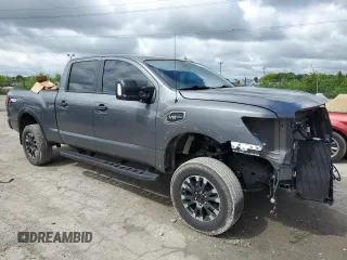 2021 Nissan Titan Pro-4X с VIN 1N6AA1FB7MN512375, выставлен на аукционе Copart как лот 58006765 с пробегом 36 959 миль миль и Списание • Salvage title. История ставок и продаж доступна на DreamBid. Изображение 4.