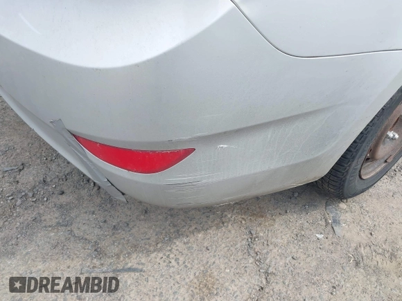 2014 Hyundai Accent GLS with VIN KMHCT4AE0EU622079, listed as a IAAI auction lot 42132818 with 132,324 mi miles. Bid and sale history available at carsss.com. Image 6.