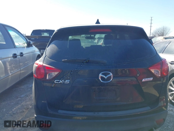 2013 Mazda CX-5 Grand Touring with VIN JM3KE2DE1D0164723, listed as a IAAI auction lot 41364590 with 227,932 mi miles. Bid and sale history available at carsss.com. Image 17.