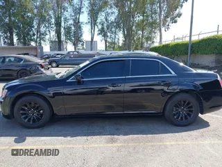 2014 Chrysler 300 with VIN 2C3CCAAG9EH264914, listed as a IAAI auction lot 42003052 with 103,789 mi miles. Bid and sale history available at carsss.com. Image 14.