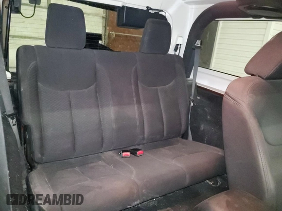 2014 Jeep Wrangler Sport with VIN 1C4AJWAG7EL197285, listed as a Copart auction lot 63451105 with 141,547 mi miles and Salvage title. Bid and sale history available at DreamBid. Image 11.