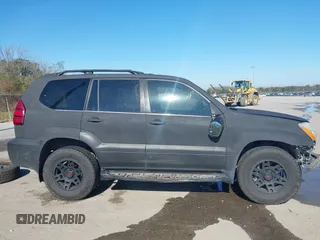 2005 Lexus GX 470 z VIN JTJBT20X150087128, wystawiony jako IAAI lot #41124756 z przebiegiem 221 052 mil mil oraz . Historia ofert i sprzedaży dostępna na DreamBid. Obrazek 13.