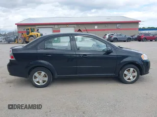2011 Chevrolet Aveo 1LT z VIN KL1TD5DE9BB203861, wystawiony jako IAAI lot #42224197 z przebiegiem 126 327 mil mil oraz . Historia ofert i sprzedaży dostępna na DreamBid. Obrazek 14.
