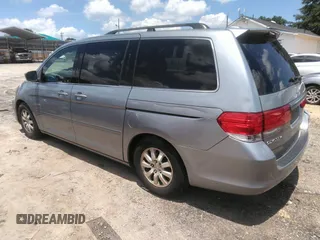 2010 Honda Odyssey EX-L z VIN 5FNRL3H74AB104446, wystawiony jako IAAI lot #42765331 z przebiegiem 319 510 mil mil oraz . Historia ofert i sprzedaży dostępna na DreamBid. Obrazek 3.
