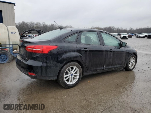 2017 Ford Focus SE with VIN 1FADP3F2XHL316724, listed as a Copart auction lot 52321155 with 137,005 mi miles and Salvage Title. Bid and sale history available at DreamBid. Image 3.