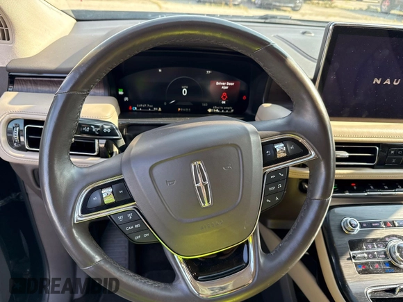 2021 Lincoln Nautilus Reserve with VIN 2LMPJ6K97MBL11486, listed as a IAAI auction lot 42841736 with 64,945 mi miles and . Bid and sale history available at DreamBid. Image 18.