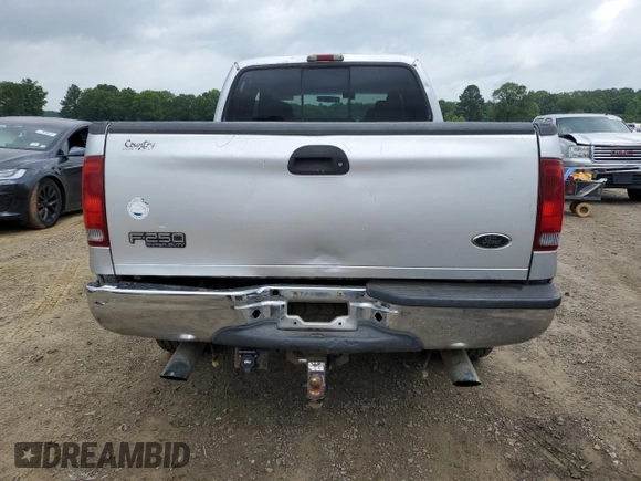 2004 Ford F-250 XL with VIN 1FTNW21L94EE03900, listed as a Copart auction lot 57838765 with 185,837 mi miles and Salvage title. Bid and sale history available at DreamBid. Image 6.