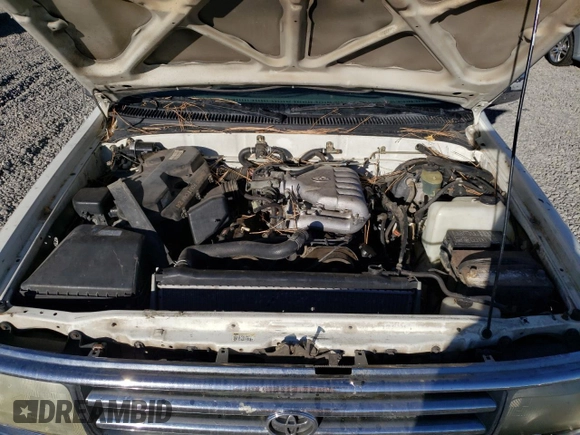 1995 Toyota T100 SR5 with VIN JT4VD12F1S0004904, listed as a Copart auction lot 75796804 with 182,011 mi miles and Salvage Title. Bid and sale history available at DreamBid. Image 11.