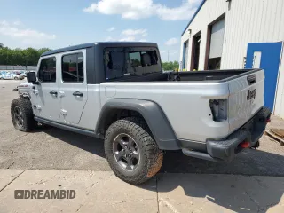 2022 Jeep Gladiator Rubicon z VIN 1C6JJTBG6NL104521, wystawiony jako Copart lot #57325365 z przebiegiem 31 498 mil mil oraz Szkoda całkowita • Salvage title. Historia ofert i sprzedaży dostępna na DreamBid. Obrazek 2.
