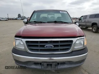 2002 Ford F-150 XL with VIN 1FTRX17W92KA57890, listed as a Copart auction lot 46894115 with 169,725 mi miles and Salvage Title. Bid and sale history available at carsss.com. Image 5.