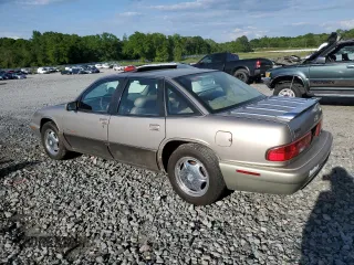 1996 Buick Regal с VIN 2G4WF52KXT1403234, выставлен на аукционе Copart как лот 52086495 с пробегом 203 388 миль миль и Списание • Salvage title. История ставок и продаж доступна на DreamBid. Изображение 2.