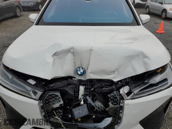 2023 BMW iX xDrive50 with VIN WB523CF04PCL67044, listed as a Copart auction lot 82805014 with 12,858 mi miles and Salvage Title. Bid and sale history available at carsss.com. Image 12.