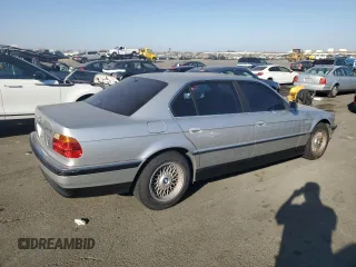 1999 BMW 7 Series 740il with VIN WBAGH833XXDP05142, listed as a Copart auction lot 74104394 with 0 mi miles and Salvage Title. Bid and sale history available at carsss.com. Image 3.