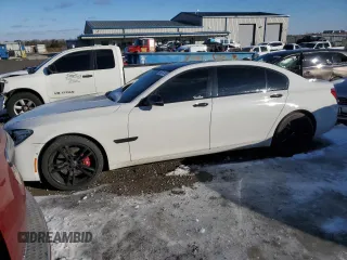 2014 BMW 7 Series ALPINA B7 with VIN WBAYE8C55ED135790, listed as a Copart auction lot 41574755 with 128,255 mi miles and Salvage Title. Bid and sale history available at carsss.com. Image 1.