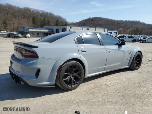 2020 Dodge Charger Scat Pack with VIN 2C3CDXGJ2LH232208, listed as a Copart auction lot 48927195 with 52,759 mi miles and Salvage Title. Bid and sale history available at carsss.com. Image 3.