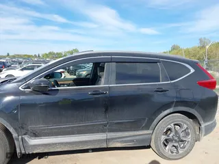 2017 Honda CR-V Touring with VIN 5J6RW2H96HL037854, listed as a IAAI auction lot 40472748 with 126,582 mi miles. Bid and sale history available at carsss.com. Image 14.