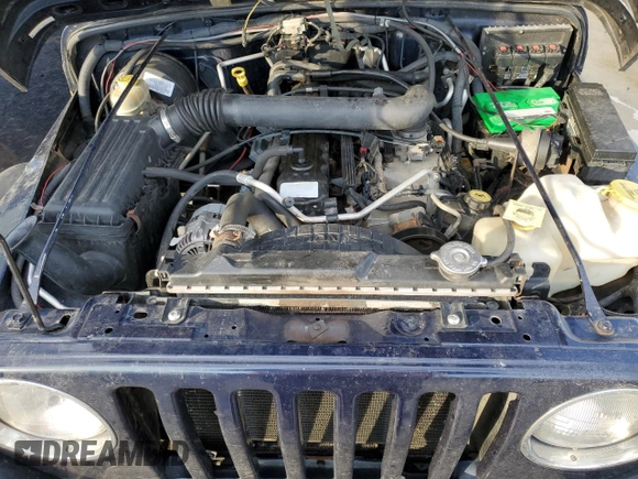 2006 Jeep Wrangler Sport Right Hand Drive with VIN 1J4F449S16P741407, listed as a Copart auction lot 88804015 with 182,059 mi miles and Salvage Title. Bid and sale history available at carsss.com. Image 12.
