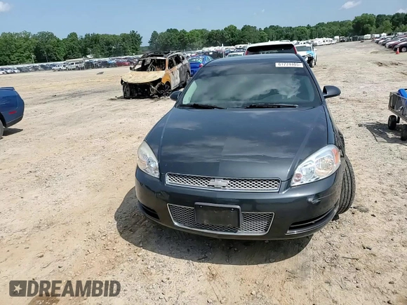 2014 Chevrolet Impala LS with VIN 2G1WA5E31E1171237, listed as a Copart auction lot 61774405 with 141,838 mi miles and Salvage title. Bid and sale history available at DreamBid. Image 13.