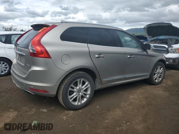 2016 Volvo XC60 T5 Drive-E Premier с VIN YV440MDK9G2784999, выставлен на аукционе Copart как лот 49850175 с пробегом Не указан миль и На запчасти • Non repairable. История ставок и продаж доступна на DreamBid. Изображение 3.