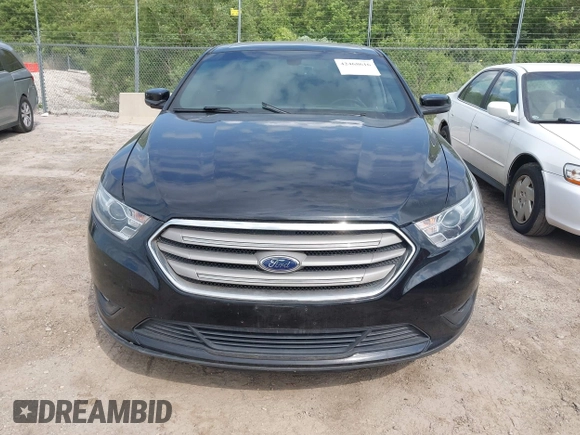 2016 Ford Taurus SEL z VIN 1FAHP2E82GG156346, wystawiony jako IAAI lot #42468616 z przebiegiem 159 425 mil mil oraz . Historia ofert i sprzedaży dostępna na DreamBid. Obrazek 12.