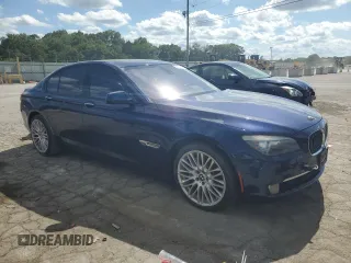 2012 BMW 7 Series with VIN WBAKX6C58CC197207, listed as a Copart auction lot 84153784 with 130,049 mi miles and Salvage title. Bid and sale history available at DreamBid. Image 4.
