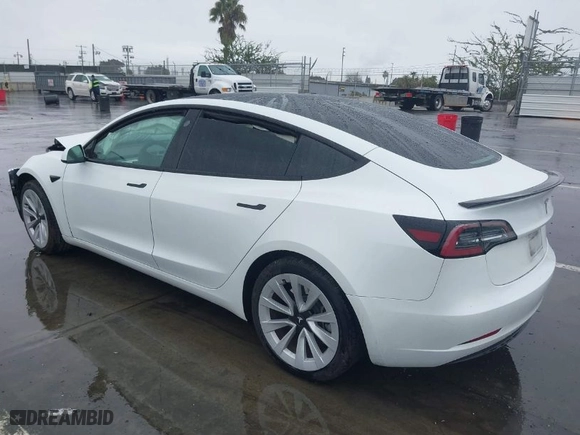 2023 Tesla Model 3 with VIN 5YJ3E1EA1PF426684, listed as a IAAI auction lot 41507661 with 28,703 mi miles. Bid and sale history available at carsss.com. Image 3.