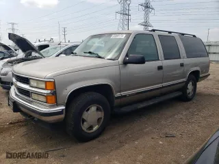 1999 Chevrolet Suburban with VIN 1GNFK16RXXJ458740, listed as a Copart auction lot 65869174 with 200,965 mi miles and Clean Title. Bid and sale history available at carsss.com. Image 1.