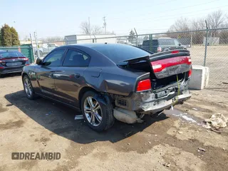 2014 Dodge Charger SXT Plus with VIN 2C3CDXJG0EH104680, listed as a IAAI auction lot 41784303 with 135,771 mi miles. Bid and sale history available at carsss.com. Image 3.