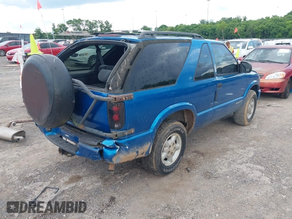 2000 Chevrolet Blazer LS z VIN 1GNCT18W6YK288858, wystawiony jako IAAI lot #42344368 z przebiegiem 207 183 mil mil oraz . Historia ofert i sprzedaży dostępna na DreamBid. Obrazek 4.