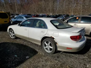2002 Mazda Millenia S z VIN JM1TA222521733260, wystawiony jako Copart lot #49984755 z przebiegiem 140 212 mil mil oraz Szkoda całkowita • Salvage title. Historia ofert i sprzedaży dostępna na DreamBid. Obrazek 2.