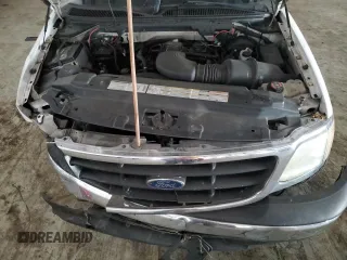 2000 Ford F-150 XL с VIN 1FTPF17L1YKA92061, выставлен на аукционе Copart как лот 66962304 с пробегом Не указан миль и Списание • Salvage title. История ставок и продаж доступна на DreamBid. Изображение 13.