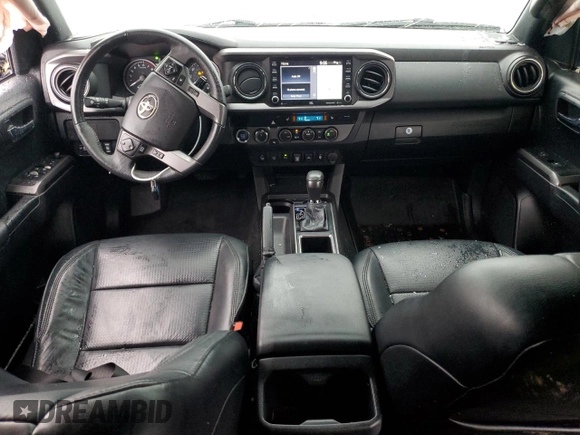 2021 Toyota Tacoma 4WD SR5 with VIN 3TMDZ5BN5MM098717, listed as a Copart auction lot 43877975 with 21,328 mi miles and Salvage Title. Bid and sale history available at carsss.com. Image 8.