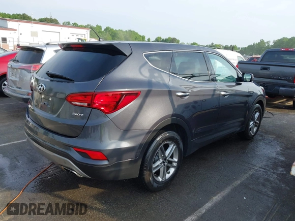 2018 Hyundai Santa Fe 2.4L with VIN 5XYZT3LB0JG525150, listed as a IAAI auction lot 42070377 with 142,418 mi miles and . Bid and sale history available at DreamBid. Image 4.