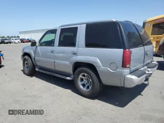1999 GMC Denali z VIN 1GKEK13R6XR914411, wystawiony jako Copart lot #56063555 z przebiegiem 231 344 mil mil oraz Szkoda całkowita • Salvage title. Historia ofert i sprzedaży dostępna na DreamBid. Obrazek 2.