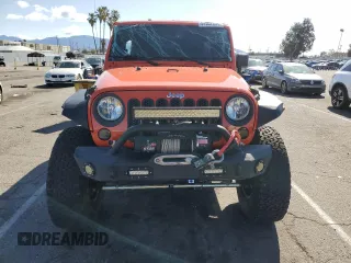 2015 Jeep Wrangler Unlimited Rubicon with VIN 1C4BJWFG7FL719038, listed as a Copart auction lot 51507205 with 62,664 mi miles and Salvage Title. Bid and sale history available at carsss.com. Image 5.