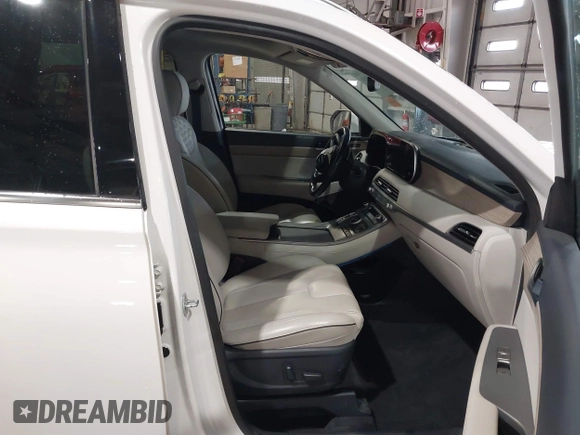 2021 Hyundai Palisade Limited z VIN KM8R5DHEXMU210597, wystawiony jako IAAI lot #41869656 z przebiegiem 56 874 mil mil oraz . Historia ofert i sprzedaży dostępna na DreamBid. Obrazek 5.