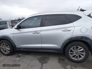 2016 Hyundai Tucson SE with VIN KM8J33A47GU242183, listed as a IAAI auction lot 41772964 with 97,527 mi miles. Bid and sale history available at carsss.com. Image 13.