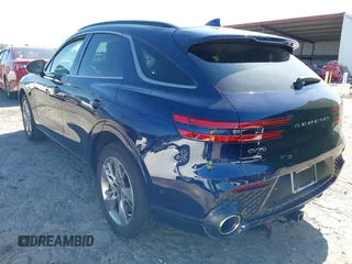 2023 Genesis GV70 Sport with VIN KMUMCDTC1PU083539, listed as a IAAI auction lot 42107968 with 21,169 mi miles and . Bid and sale history available at DreamBid. Image 3.
