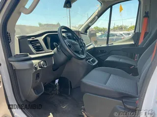 2023 Ford Transit Cargo with VIN 1FTBR1X87PKB99515, listed as a IAAI auction lot 42821393 with 10,442 mi miles and . Bid and sale history available at DreamBid. Image 3.