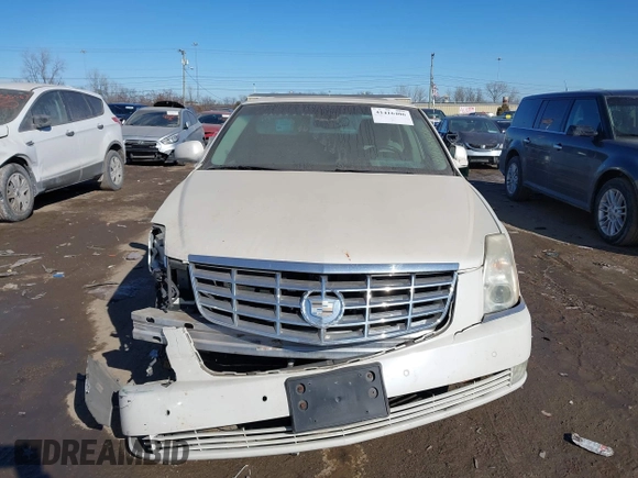 2008 Cadillac DTS 1SD z VIN 1G6KD57YX8U146211, wystawiony jako IAAI lot #41416406 z przebiegiem 141 362 mil mil oraz . Historia ofert i sprzedaży dostępna na DreamBid. Obrazek 12.