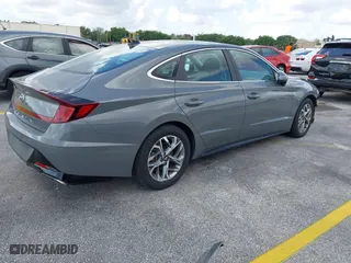 2023 Hyundai Sonata SEL with VIN KMHL64JA0PA270047, listed as a IAAI auction lot 42022365 with 57,904 mi miles. Bid and sale history available at carsss.com. Image 4.