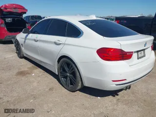 2016 BMW 4 Series 428i with VIN WBA4A9C50GG505299, listed as a IAAI auction lot 41657501 with 89,856 mi miles. Bid and sale history available at carsss.com. Image 3.