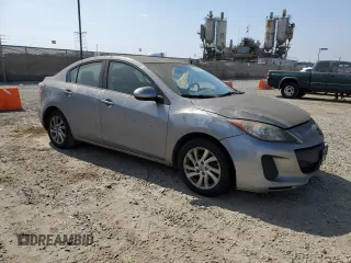 2012 Mazda 3 i Touring with VIN JM1BL1V86C1557191, listed as a Copart auction lot 63002985 with 218,863 mi miles and Clean title. Bid and sale history available at DreamBid. Image 4.