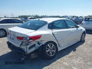 2018 Kia Optima LX with VIN 5XXGT4L33JG193537, listed as a IAAI auction lot 42033237 with 150,944 mi miles. Bid and sale history available at carsss.com. Image 4.