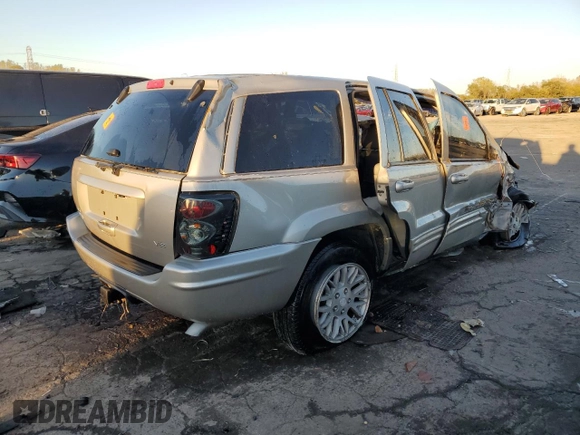 2004 Jeep Grand Cherokee Limited with VIN 1J8GX58N14C170162, listed as a Copart auction lot 74274044 with Not Provided miles and Salvage Title. Bid and sale history available at DreamBid. Image 3.