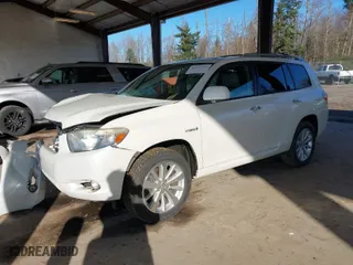2009 Toyota Highlander Hybrid Limited with VIN JTEEW44A092035066, listed as a IAAI auction lot 41527468 with 166,339 mi miles. Bid and sale history available at carsss.com. Image 2.