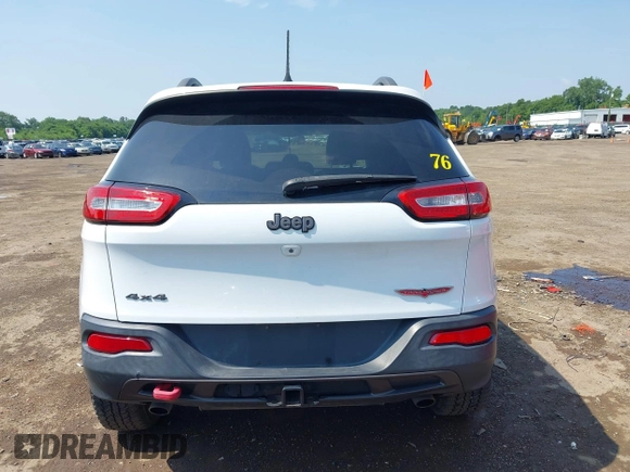 2014 Jeep Cherokee Trailhawk z VIN 1C4PJMBS0EW188976, wystawiony jako IAAI lot #42587233 z przebiegiem 191 670 mil mil oraz . Historia ofert i sprzedaży dostępna na DreamBid. Obrazek 16.