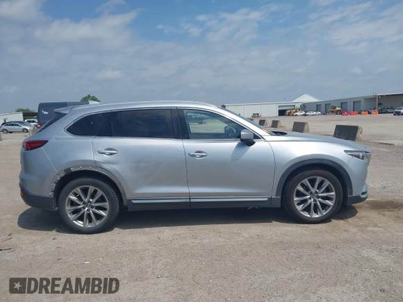 2016 Mazda CX-9 Signature with VIN JM3TCBEY9G0117785, listed as a IAAI auction lot 42331883 with 115,096 mi miles and . Bid and sale history available at DreamBid. Image 13.